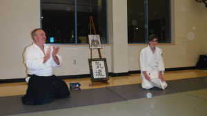 Jackson-san is recognized by Blevins Sensei for attaining 125 hours of practice.